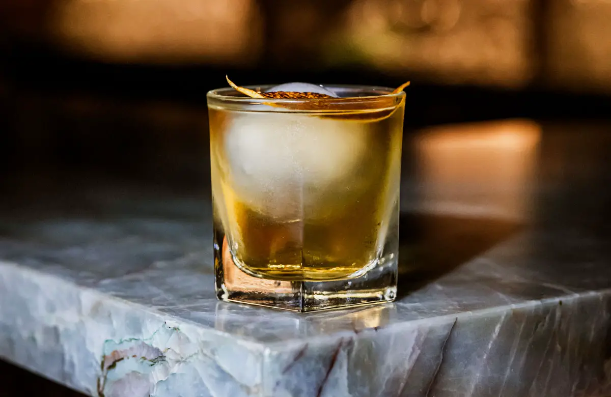 One of Arcana's handcrafted cocktails is served inside the new 47-seat cocktail den in Encinitas. Photo by Gretchen Dunn