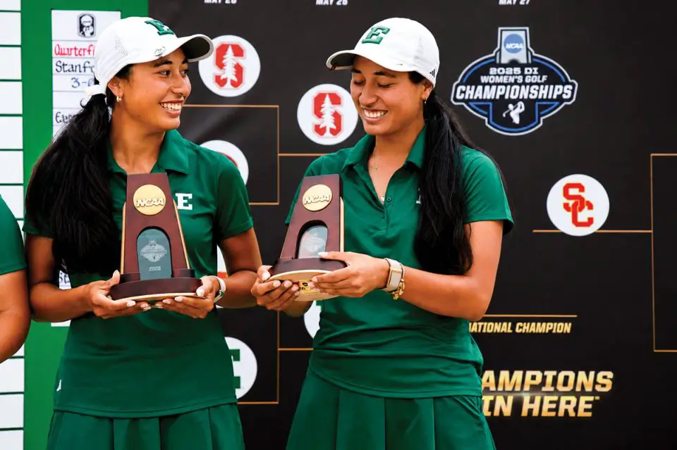 El Camino High School alums Jasmine and Janae Leovao of Eastern Michigan hold their national semifinalist trophies after the Division I Women’s Golf Championships in Carlsbad. Photo by C. Morgan Engel/NCAA Photos