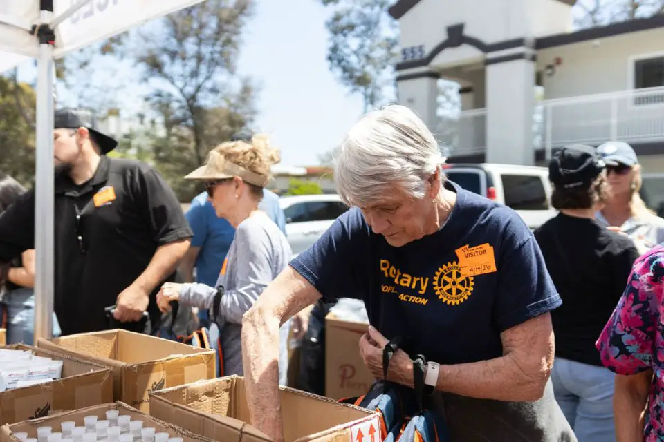 Volunteers at Interfaith Community Services' backpack drive last month. The nonprofit received a portion of Carlsbad's federal grant money for public service activities. Courtesy photo/Interfatih