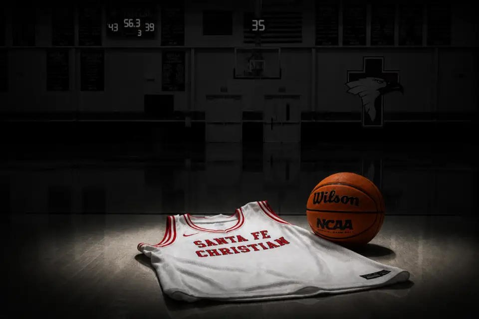 A lawsuit against Santa Fe Christian Schools alleges student-athletes were secretly recorded inside a choir room used during a basketball game. The Coast News graphic
