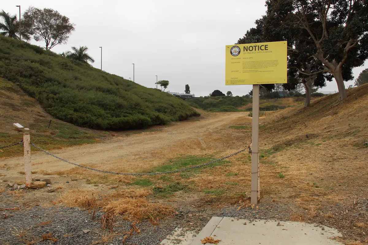Signage at entry to lot: Salk Avenue apartments