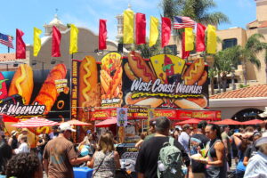 A view of a food stand called West Coast Weenies.