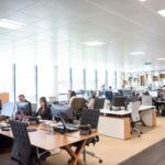 Business leaders using AI analytics to manage workforce transitions and organizational change