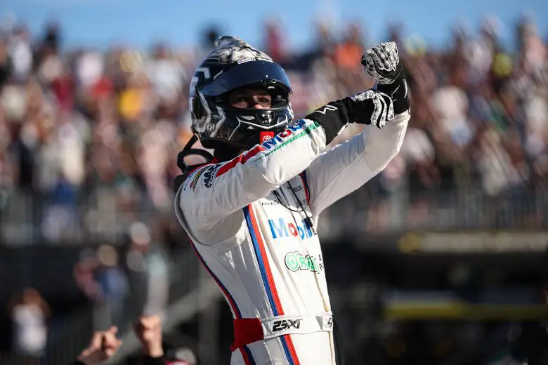 Corey Heim celebrates his first NASCAR Cup Series victory with a burnout in the No. 67 23XI Racing Toyota following the inaugural Anduril 250 on the streets of Naval Air Station North Island in Coronado on June 22. Heim took the lead with three laps remaining to win the first NASCAR Cup Series race held on a military installation. Courtesy photo/Getty