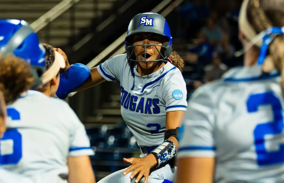 CSUSM senior outfielder Czar Fleischman celebrates during a postseason game. Photo by Nico Klementzos