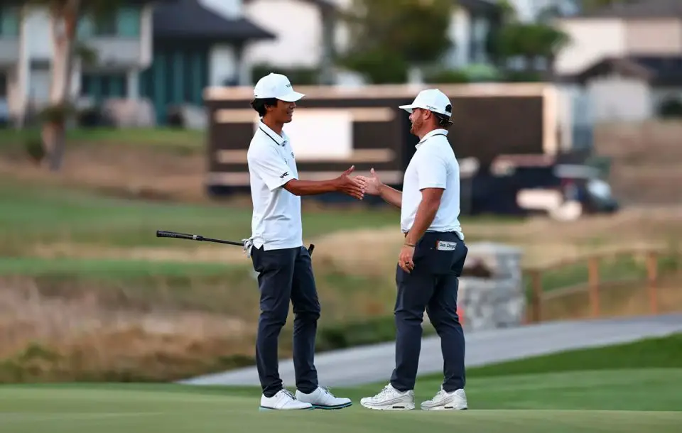 University of San Diego head coach Evan Emerick, left, and senior golfer Ian Maspat during the NCAA Men’s Golf Championship at Omni La Costa Resort & Spa in Carlsbad. Photo by Thomas Christensen