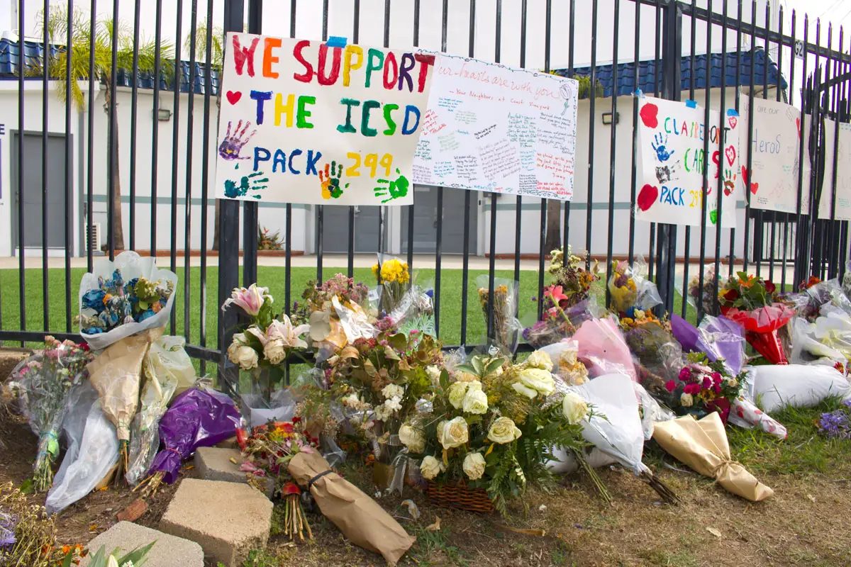 Flowers, handwritten notes and other messages of support adorn the front fence of the Islamic Center of San Diego following the May 18 mass shooting that killed three people and left worshippers, students and community members shaken. Local Muslim advocacy groups say the tragedy underscores the importance of education and efforts to combat Islamophobia and anti-Arab hate. Photo by Leo Place