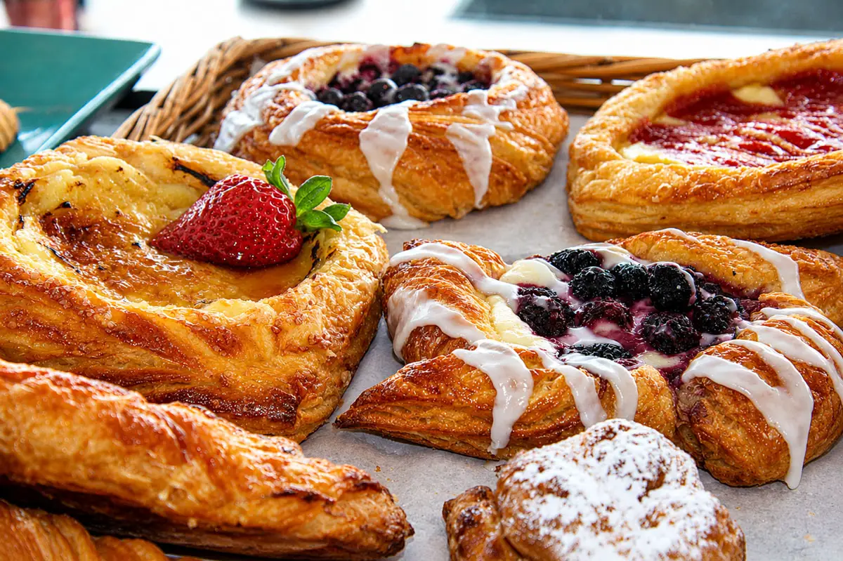 A selection of fruit Danishes is displayed at Kettle on Coast, which serves house-made pastries, coffee and Mediterranean-inspired cuisine along Coast Highway in Oceanside. Photo by Samantha Nelson