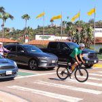 A cyclist travels west along Lomas Santa Fe near Santa Helena in Solana Beach.