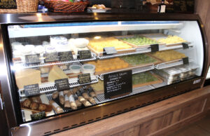 The Pastaria Vivi display case features fresh pasta, meats and cheeses that customers can purchase to enjoy at home. Photo by Rico Cassoni