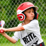 A young player works on his swing during batting practice at Reitz Baseball Camp. Courtesy photo/Reitz