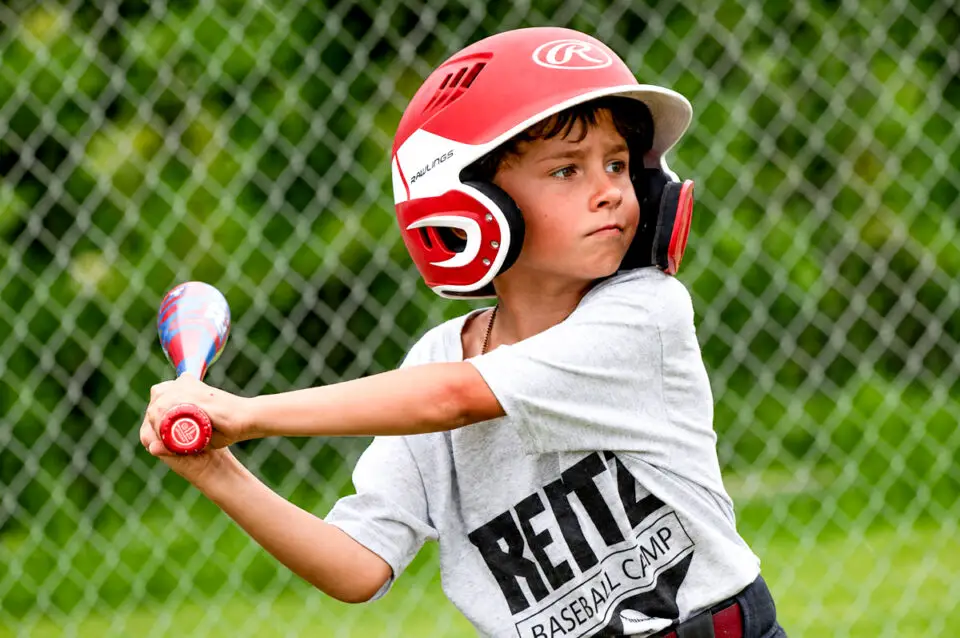 A young player works on his swing during batting practice at Reitz Baseball Camp. Courtesy photo/Reitz