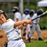 Rowan Reitz, 8, swings during batting practice earlier this month at Reitz Baseball Camp in Encinitas. Courtesy photo/Reitz