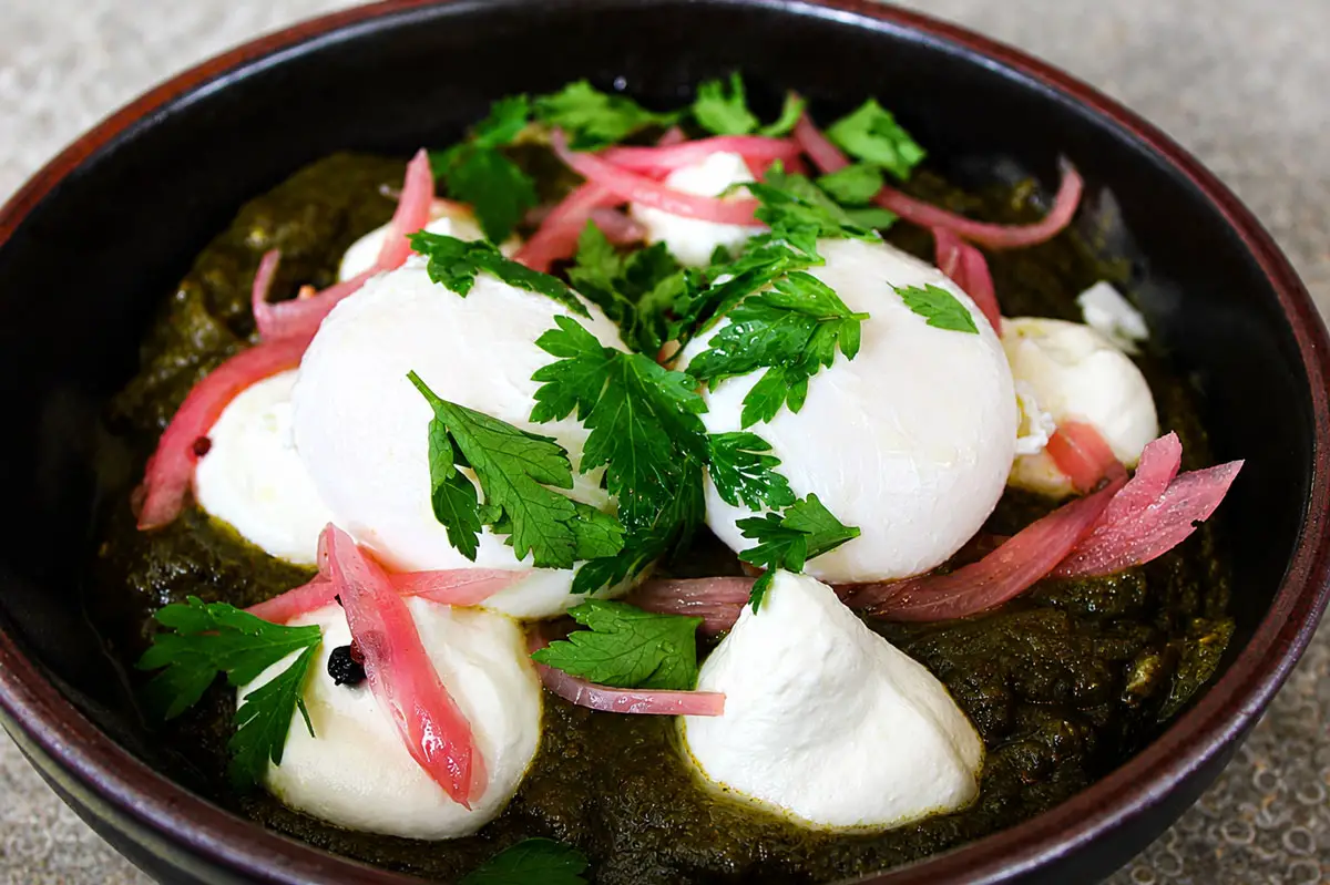 The Shakshuka Verde, featuring eggs poached in a green sauce inspired by North African and Mediterranean flavors, is one of the signature dishes at Kettle on Coast in Oceanside. Photo by Samantha Nelson