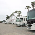 A row of parked RVs.