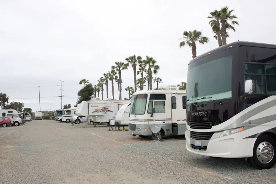 A row of parked RVs.
