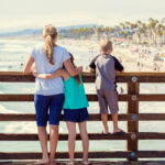 Family enjoying the ocean view from Oceanside Pier in Oceanside, California.
