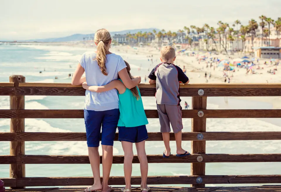 Family enjoying the ocean view from Oceanside Pier in Oceanside, California.