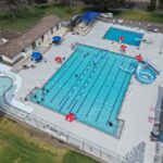An aerial view of Woodland Park Pool and the pool deck.