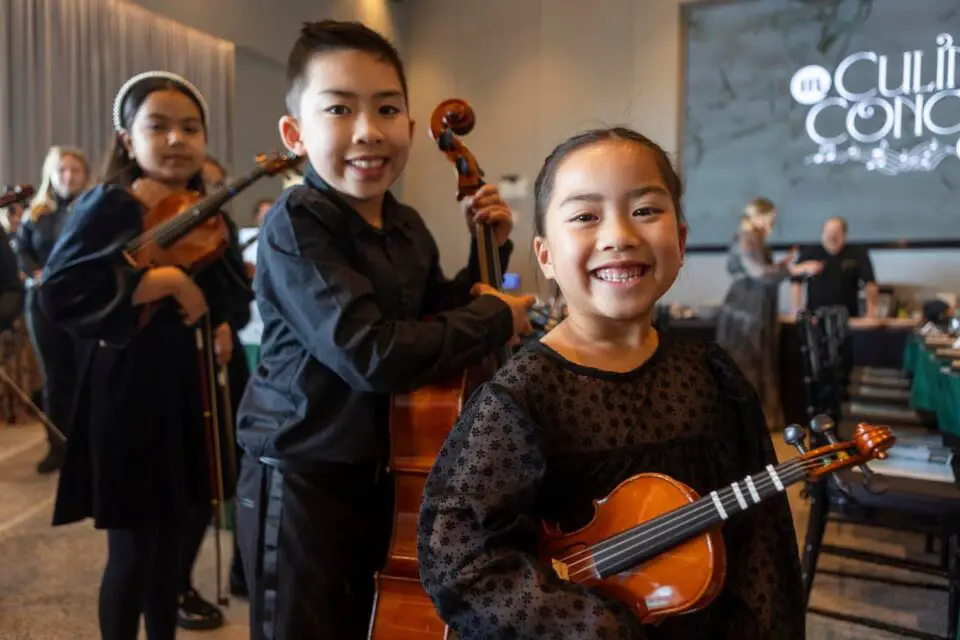 Two children with instruments