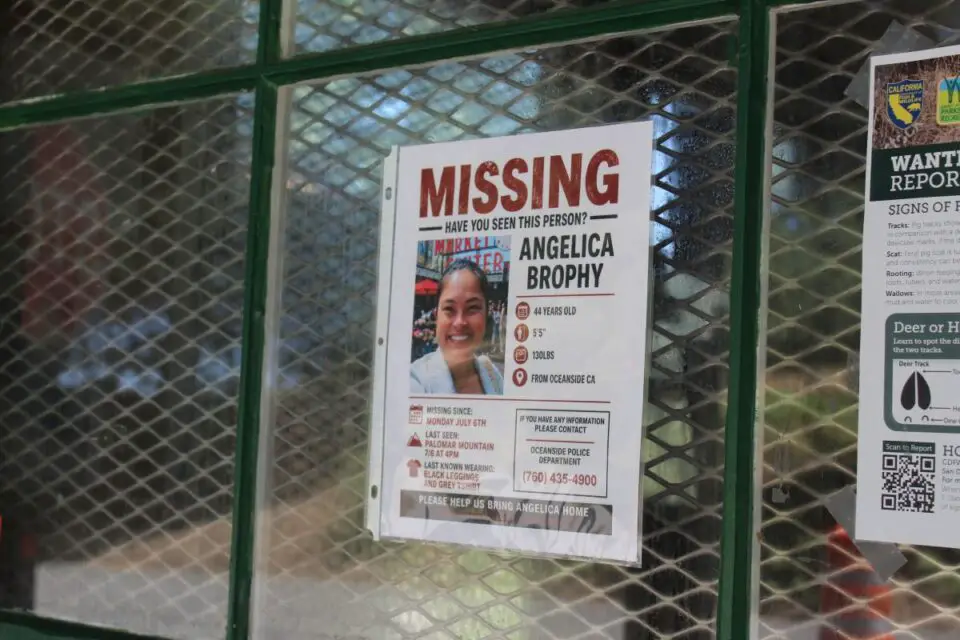 Angelica Brophy's missing-person poster hangs at the entrance to Palomar Mountain State Park. Brophy's car was found in the park on July 9, three days after she was reported missing. Photo by Samantha Nelson
