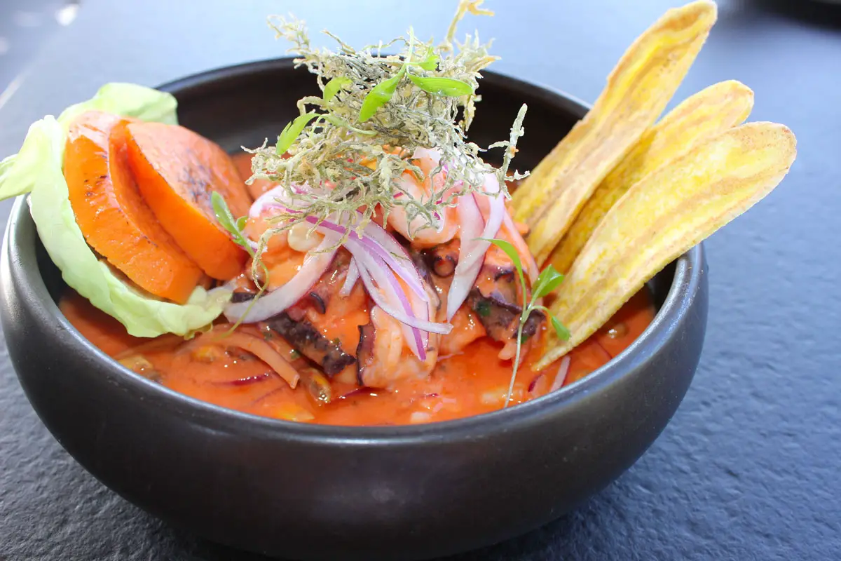 Ceviche Manka combined mahi mahi, tender octopus, shrimp, choclo and chulpi corn, sweet potato brule, fried seaweed, and crisp plantain chips.  Photo by Rico Cassoni
