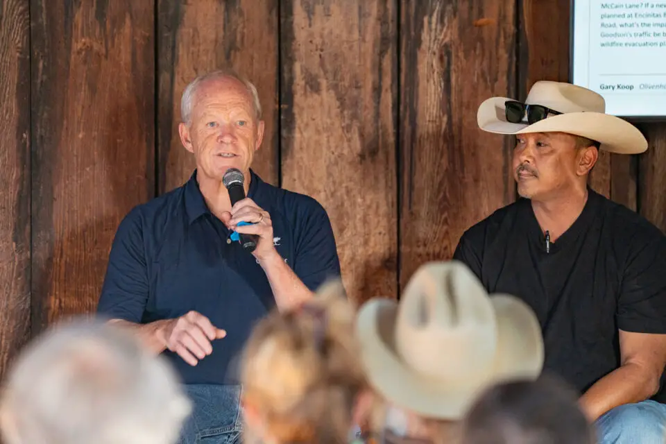 Mayor Bruce Ehlers and Councilmember Marco San Antonio speak with Encinitas residents about traffic safety on July 22 at the Olivenhain Town Meeting Hall. Photo by Tanya Perez