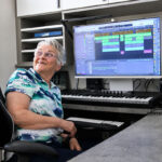 La Costa Glen resident Candy Carrigan working on a song. Photo by Cameron Adams
