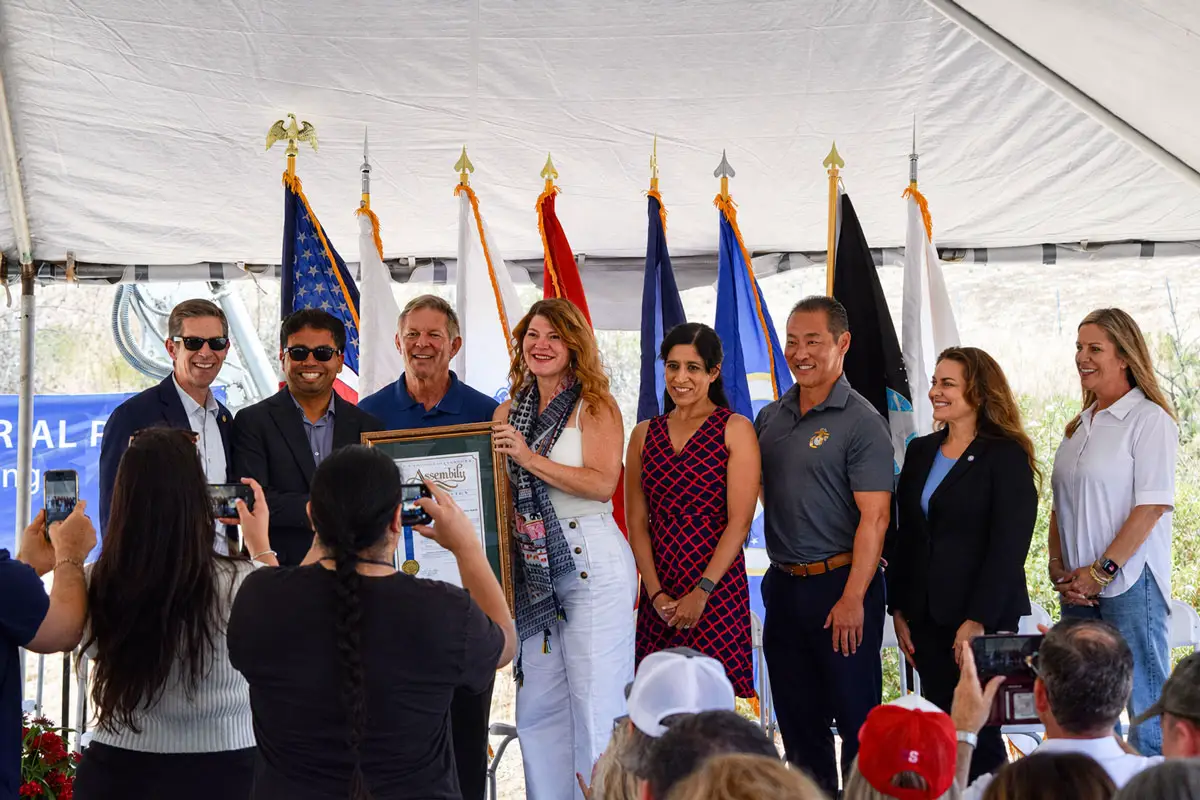 State and local officials, smile for a photo during a July 6 groundbreaking ceremony for Veterans Memorial Park in Carlsbad. Photo by Summer Hu