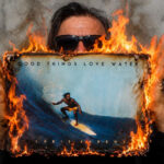 Author and columnist Chris Ahrens holds a copy of "Good Things Love Water." Photo by T-Roc
