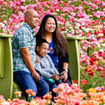 A family gathers for a portrait at The Flower Fields, one of Carlsbad's popular family-friendly destinations. File photo/Steve Puterski