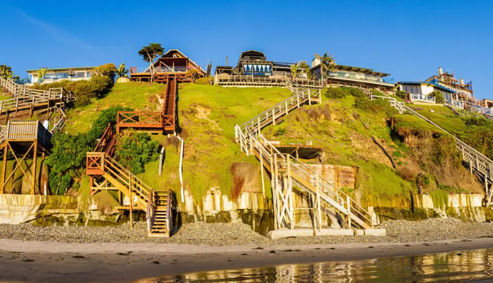 Clifftop homes overlook Grandview Beach in Encinitas. Photo by Billy McDonald