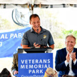 Councilmember Kevin Shin, a Marine veteran, addresses the crowd during the groundbreaking ceremony for Veterans Memorial Park on July 6 in Carlsbad. Photo by Summer Hu