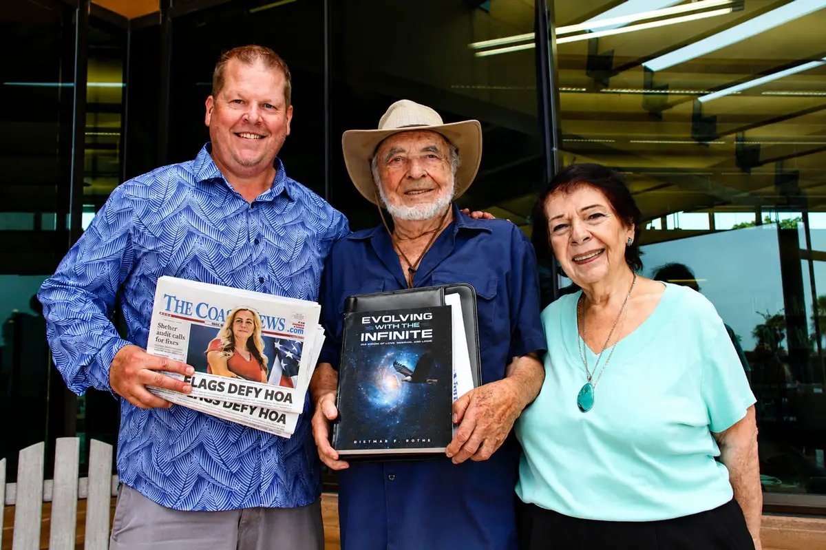 The Coast News Publisher Chris Kydd with local author Dietmar Rothe during an awards ceremony for the winners of The Coast News Teen Writing Contest on July 9 at the Encinitas Library. Photo by Jordan P. Ingram