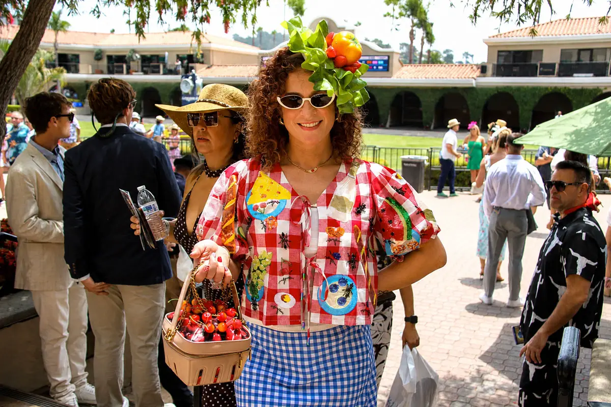 Ariel Green of Las Vegas wears a picnic-inspired outfit during Del Mar's 2026 Opening Day festivities on July 17. Photo by Leo Place