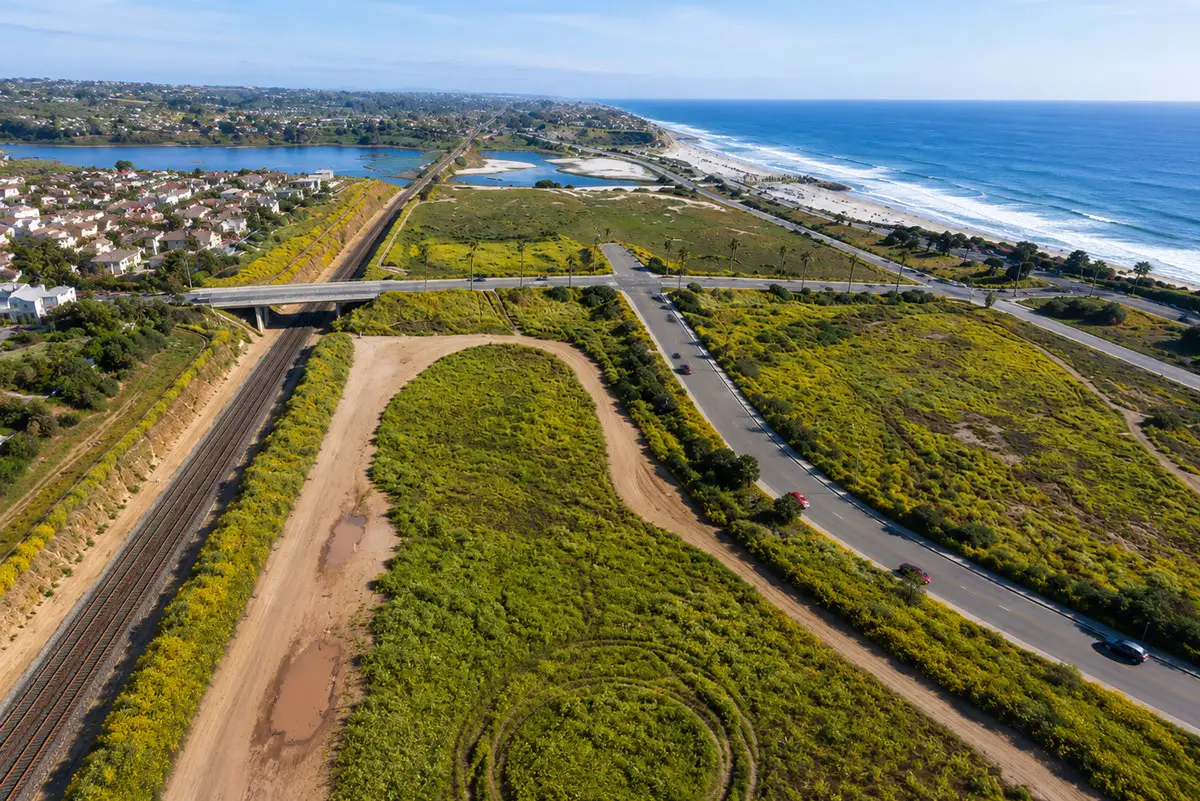 An aerial view shows Planning Area F between Coast Highway and Interstate 5 in Carlsbad, where state regulators are expected to consider amendments tied to a proposed mixed-use development.