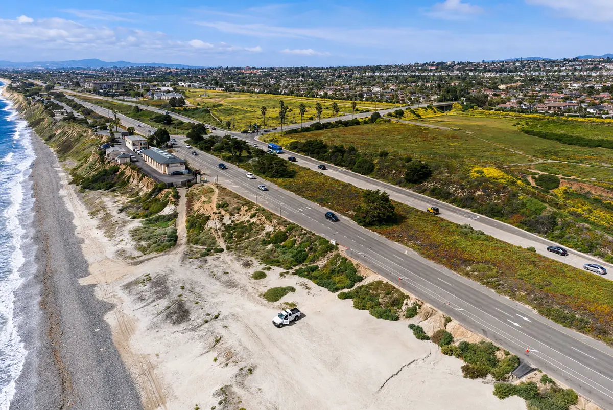 The view north from Ponto Beach shows Planning Area F, a vacant 11.1-acre property that has become the focus of a long-running dispute over development and public open space in Carlsbad. Courtesy photo/Lance Schulte