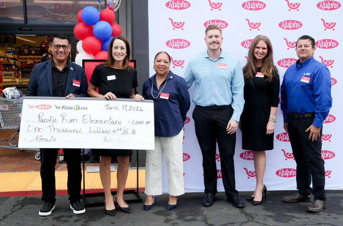 Ralphs officials, community leaders and guests celebrate the grand opening of the remodeled La Costa grocery store during a ribbon-cutting ceremony. Photo by Cameron Adams