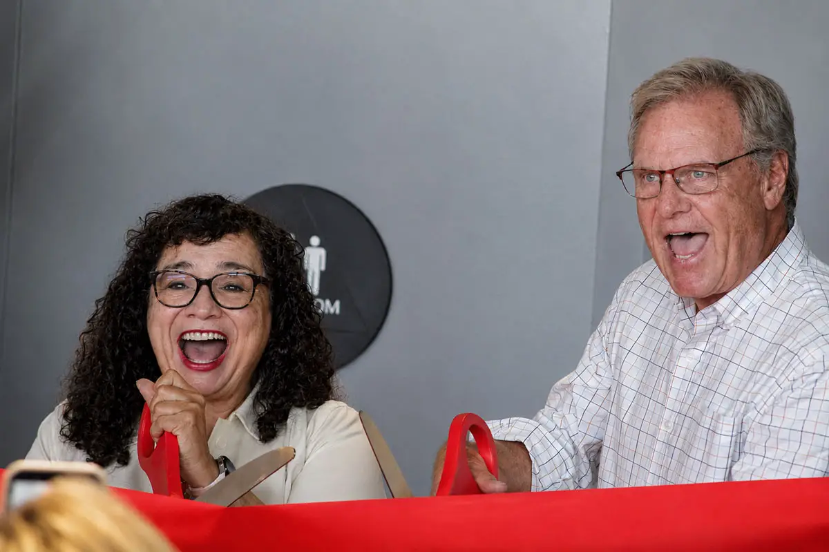 Oceanside Mayor Esther Sanchez and County Supervisor Jim Desmond cut the ribbon celebrating the completion of the first phase of renovations at the Sunshine Brooks Theater. Photo by Samantha Nelson.