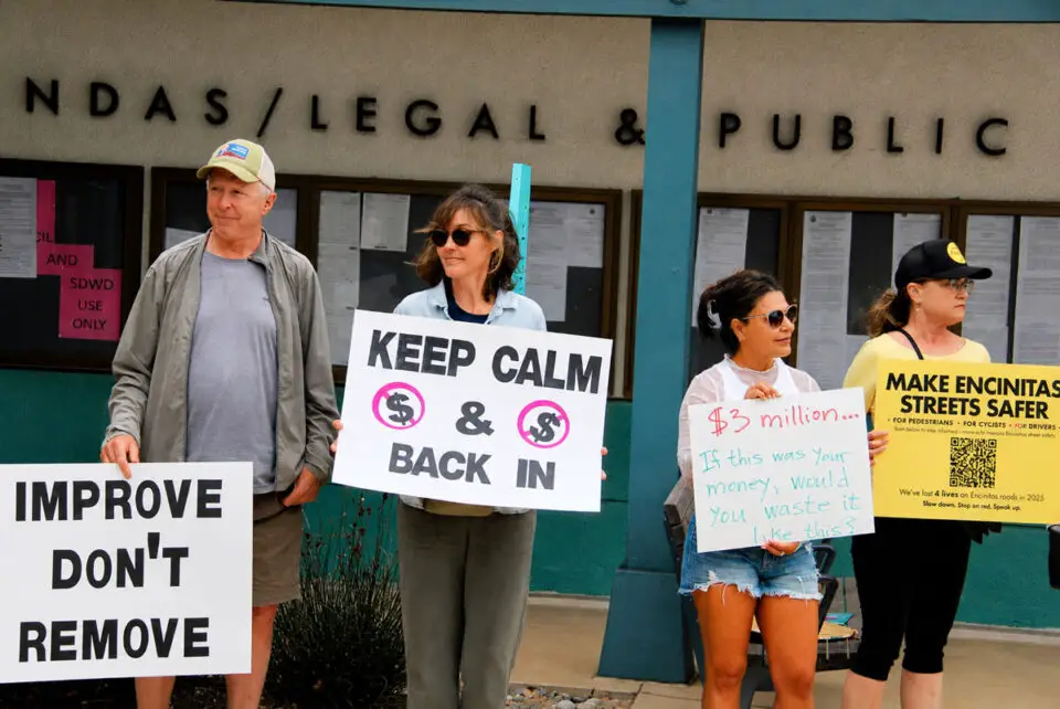 Demonstrators gather outside Encinitas City Hall on June 24 to protest the proposed overhaul of improvements along Santa Fe Drive. Photo by Summer Hu