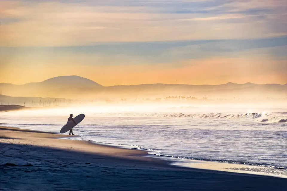 For many surfers, time in the ocean inspires more than a love of waves. Photo by Gloria Moeller
