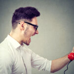 Most people just want to be heard, so allow customers to explain the problem without interruption. Stock photo