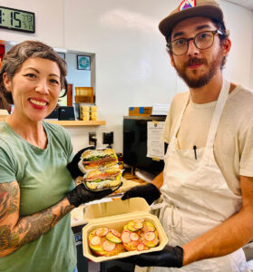 Chef-owners Cheryl Storms and Matt Cardwell with some of their new sandwich and toast options. Photo by David Boylan