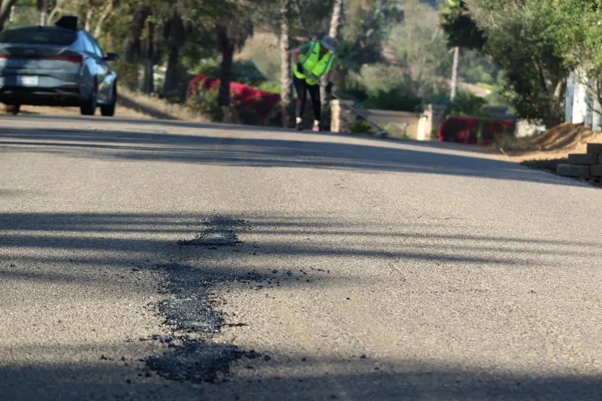 A group of Fallbrook residents filled more than 100 potholes along local roads over the summer. Photo by Samantha Nelson