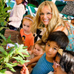 Artist and teacher Summer Wyman, pictured with students in her garden studio in Carmel Valley, is now offering art classes for people of all ages at the Surf and Turf Tennis Center in Del Mar. Courtesy photo