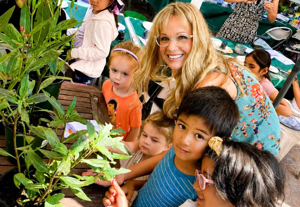Artist and teacher Summer Wyman, pictured with students in her garden studio in Carmel Valley, is now offering art classes for people of all ages at the Surf and Turf Tennis Center in Del Mar. Courtesy photo