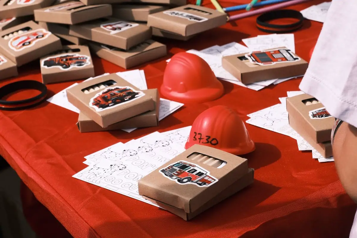 Crayons and other back-to-school materials line a table at the Carlsbad Firefighters Association booth during the Back 2 School Bash on Aug. 20 at Poinsettia Park. Courtesy photo