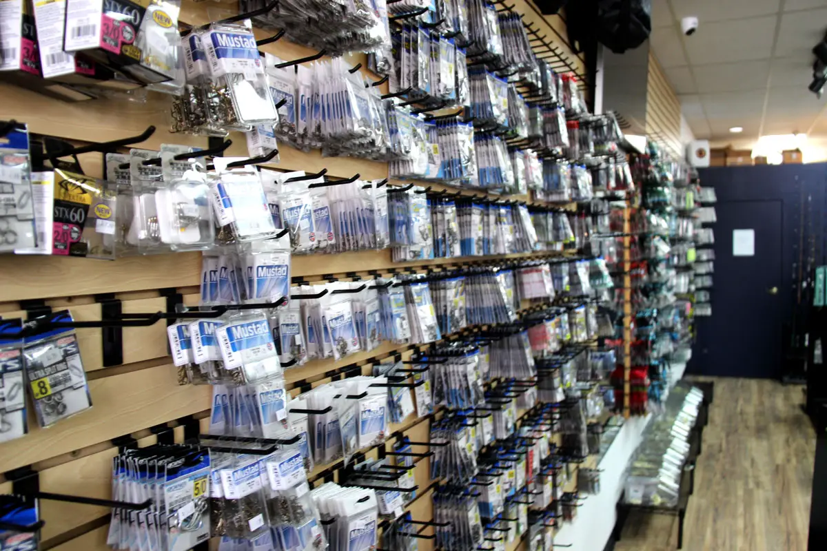 Fishing gear lines the interior of North County Bait & Tackle, a family-owned shop that opened in Encinitas in July. Photo by Cameron Adams