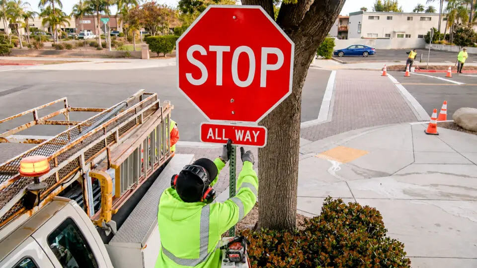 City crews install new all-way stop signs at the intersection of Grand Avenue and Madison Street in Carlsbad in April 2026. Courtesy photo/City of Carlsbad