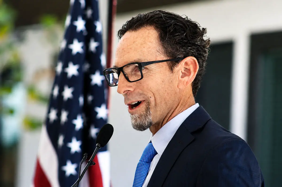 San Diego Community Housing Corp. Vice President John Wurster speaks during the July 30 ribbon-cutting ceremony for Mirasol Meadows in Fallbrook. The event also included the groundbreaking for the nearby Brookview Senior Villas affordable housing development. Photo by Samantha Nelson